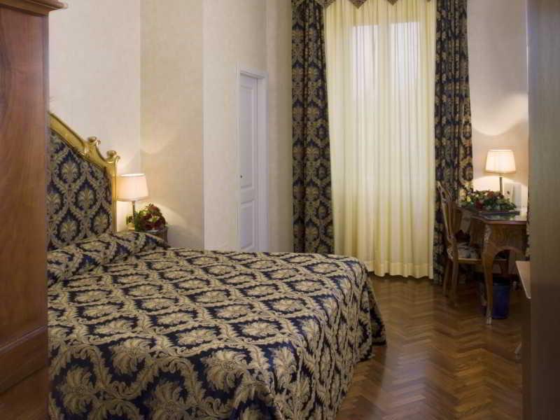 Hotel Vittoria Pesaro Exteriér fotografie A room at the hotel